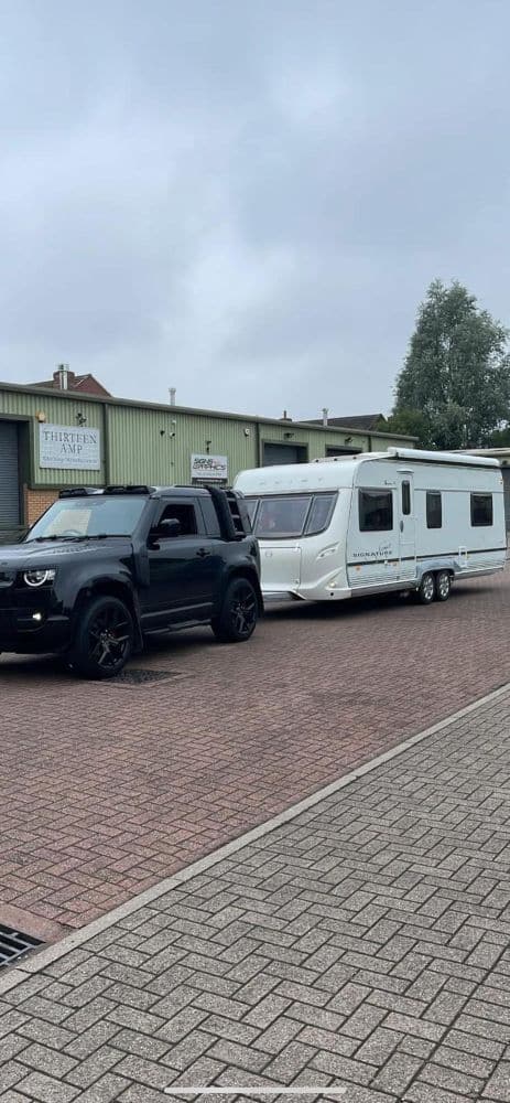 Twin-axle touring caravan collected by Global Leisure